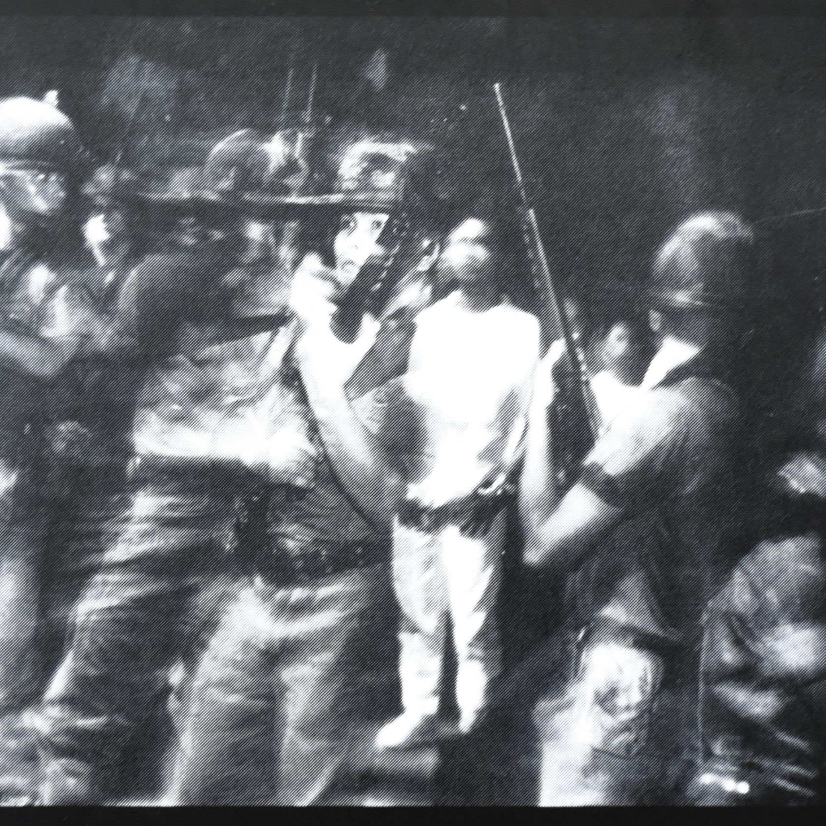 Image © Philip Blenkinsop, From the exhibition 'Monks, Dogs, Death and Men with Guns'